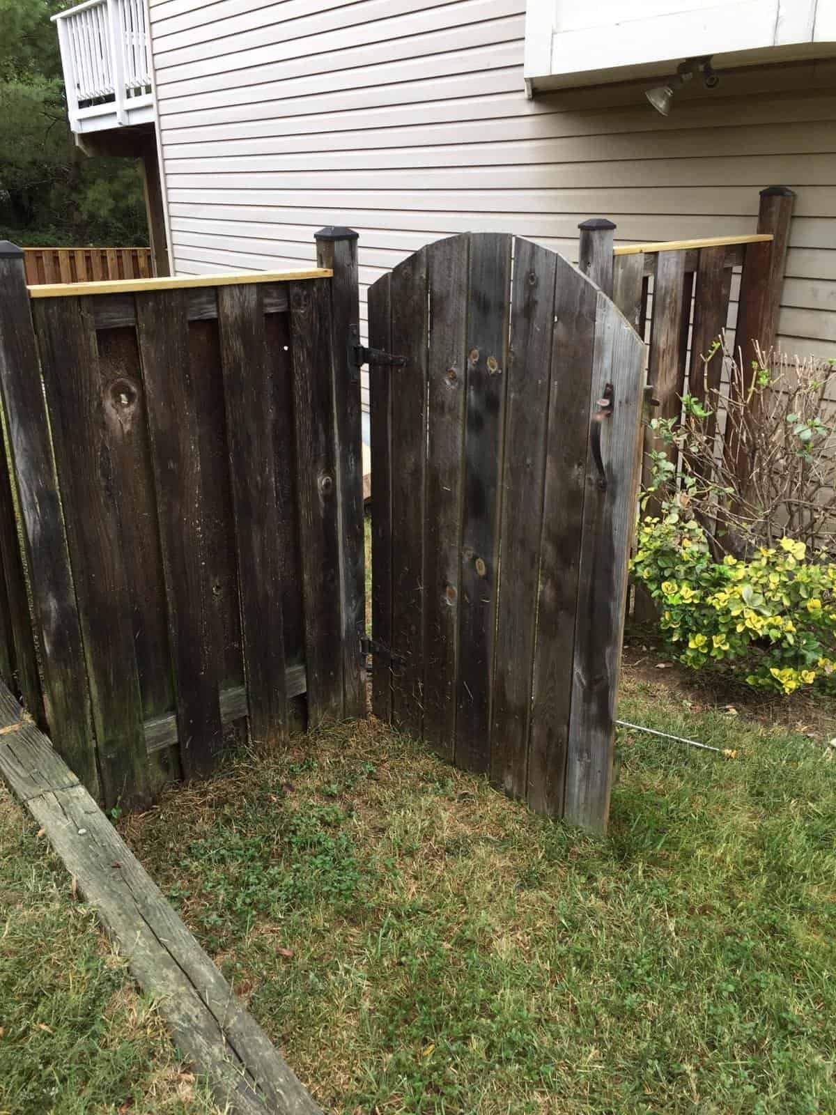 Wooden backyard gate for exterior door repair or replacement.