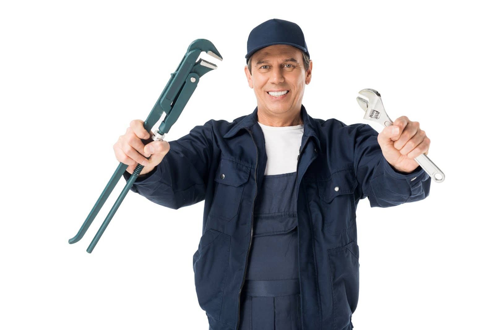 Skilled handyman holding adjustable wrench and pliers for home repair services.